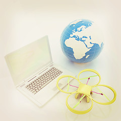 Image showing Drone or quadrocopter with camera with laptop. Network, online, 