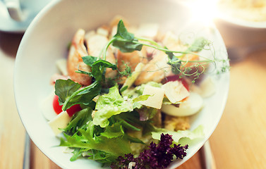 Image showing close up of caesar salad on plate at restaurant