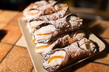 Image showing pastry on plate at bakery