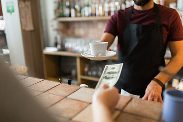 Image showing man or bartender serving customer at coffee shop