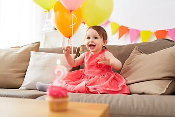 Image showing happy baby girl on birthday party at home