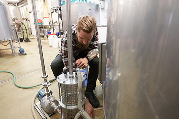 Image showing man working at craft beer brewery