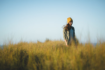 Image showing Yellow cap women