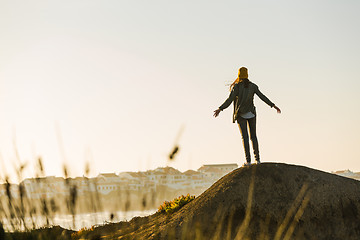 Image showing Woman over the cliff