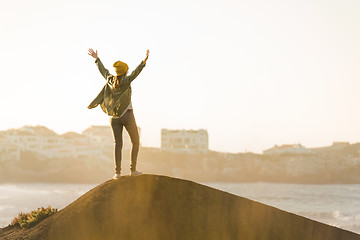 Image showing Woman over the cliff