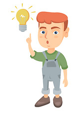 Image showing Caucasian little boy pointing at the lightbulb.