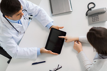 Image showing doctor and young woman meeting at hospital