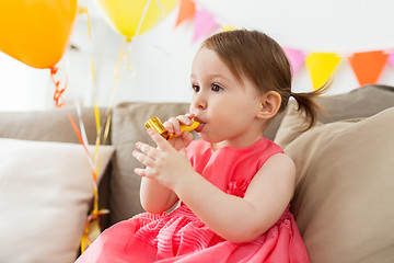 Image showing happy baby girl on birthday party at home