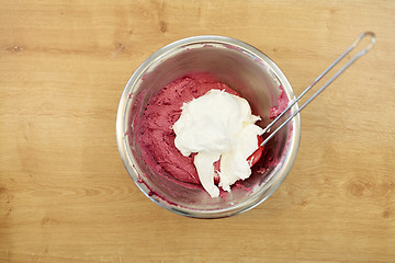 Image showing macaron batter with whipped egg whites in bowl