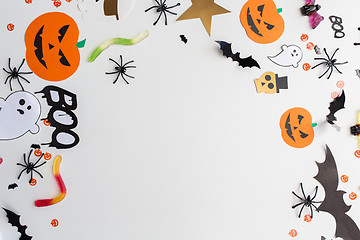 Image showing halloween party paper decorations and sweets