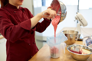 Image showing chef making macaron batter at kitchen