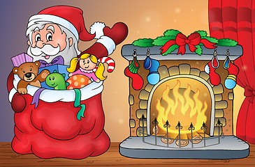 Image showing Santa Claus with gifts by fireplace