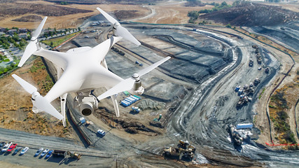 Image showing Unmanned Aircraft System (UAV) Quadcopter Drone In The Air Over 