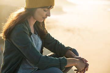 Image showing Sitting over the cliff