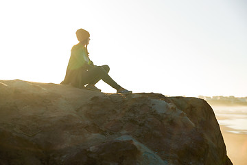 Image showing Sitting over the cliff