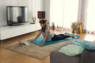 Image showing Doing exercise at home