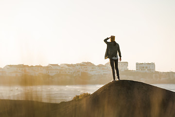 Image showing Woman over the cliff