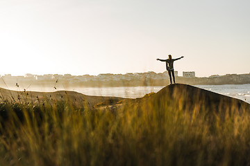 Image showing Woman over the cliff