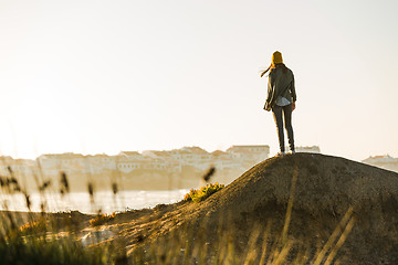 Image showing Woman over the cliff