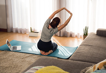 Image showing Doing exercise at home