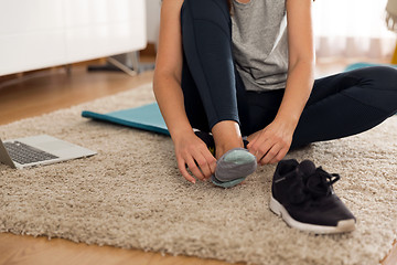 Image showing Putting on my shoes