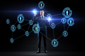 Image showing businessman with virtual network contacts