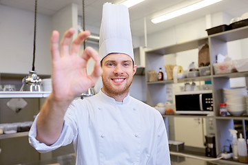 Image showing happy chef at restaurant kitchen showing ok sign