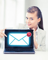 Image showing businesswoman with laptop in office