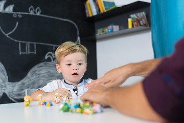 Image showing Cute little toddler boy at child therapy session.