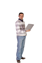 Image showing Businessman Posing with his Laptop