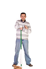 Image showing Casual Man Posing with a Sweeper