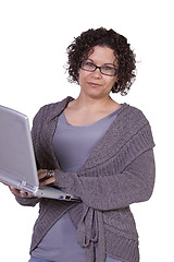 Image showing Beautiful Girl Holding a Laptop