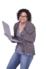 Image showing Beautiful Girl Holding a Laptop