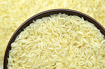 Image showing White basmati rice with wooden bowl