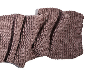 Image showing knitted brown scarf isolated on white background