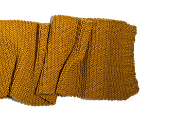Image showing knitted yellow scarf isolated on white background
