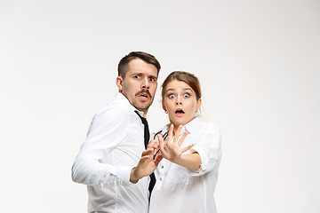 Image showing Successful business couple at the office looking at camera