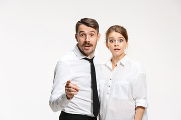 Image showing Successful business couple at the office looking at camera