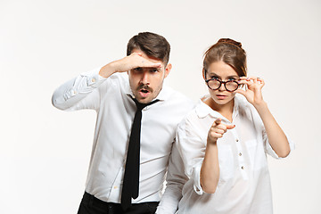 Image showing Successful business couple at the office looking at camera