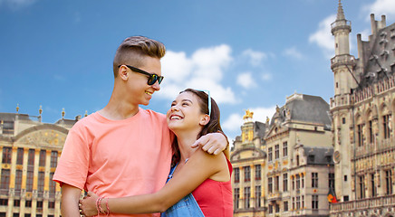 Image showing happy teenage couple hugging in brussels city