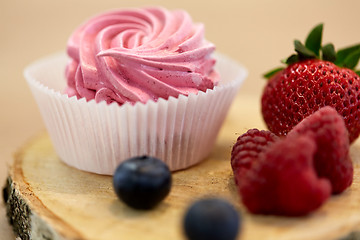 Image showing zephyr or marshmallow with berries on stand