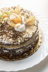 Image showing cake with walnuts and physalis