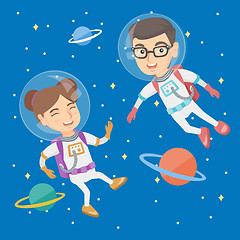 Image showing Caucasian astronaut kids in suits flying in space.