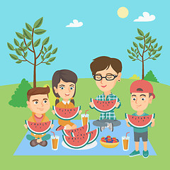 Image showing Mother with kids eating watermelon at the park.