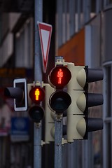 Image showing Red traffic light in urban street