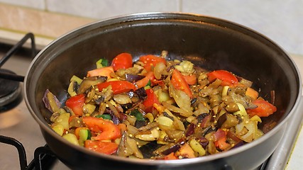 Image showing Preparing hot breakfast