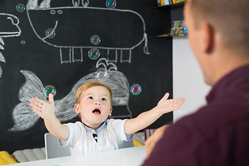 Image showing Cute little toddler boy at child therapy session.