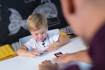 Image showing Cute little toddler boy at child therapy session.