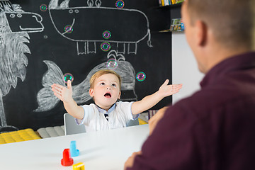 Image showing Cute little toddler boy at child therapy session.