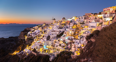 Image showing Oia village at sunset, Santorini island, Greece.